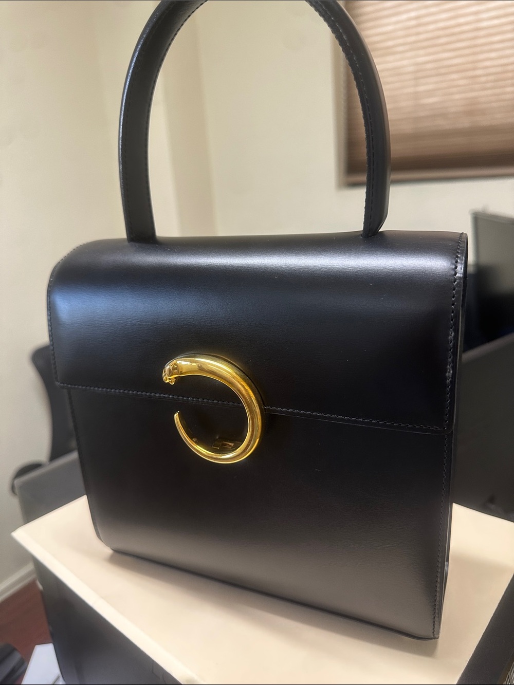 Cartier Black Leather Top-Handle Satchel with Gold C-Closure
made in France